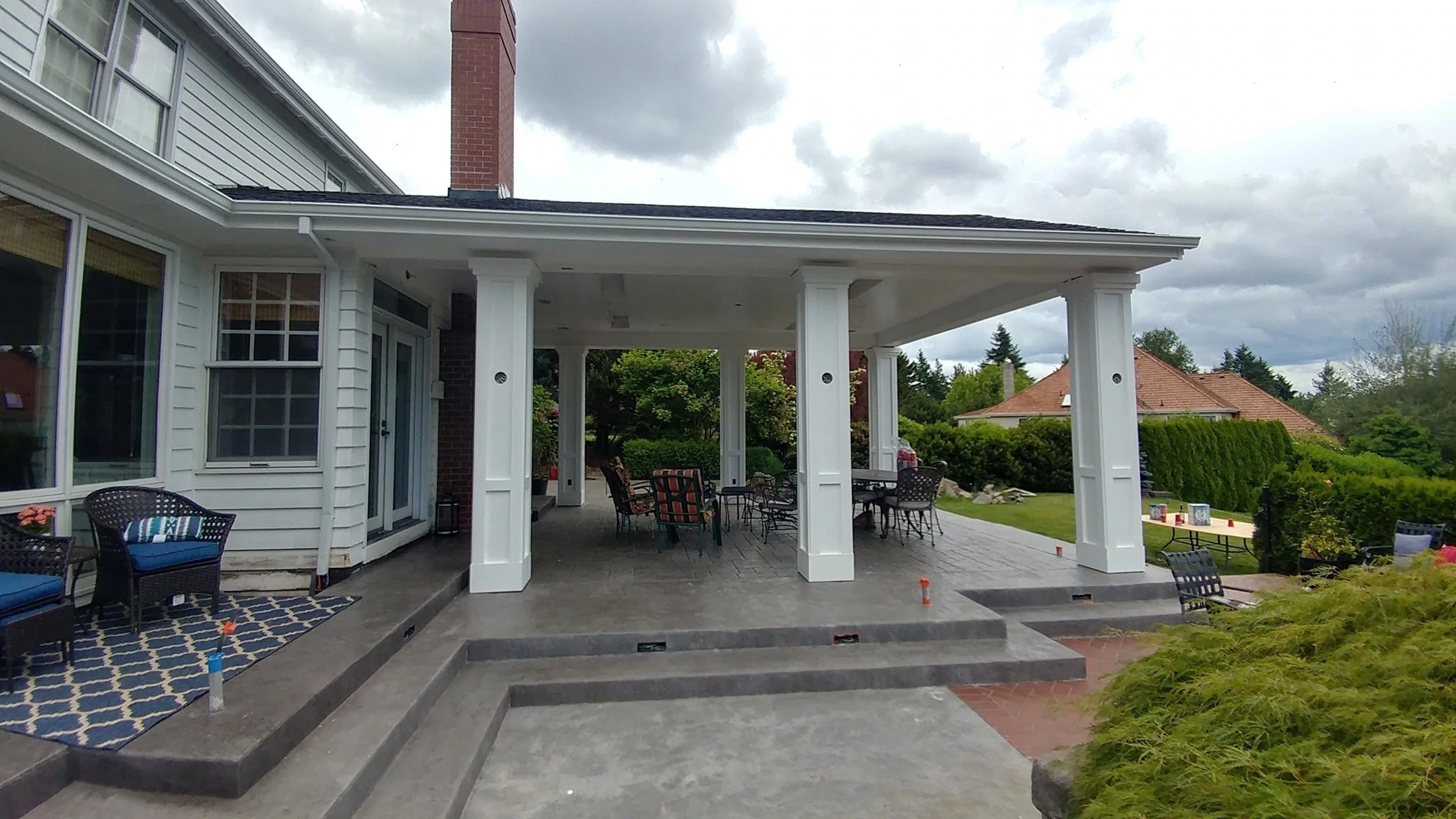 Outdoor living Design John Breiling
Cedar Mill Deck Company
Covered Patio